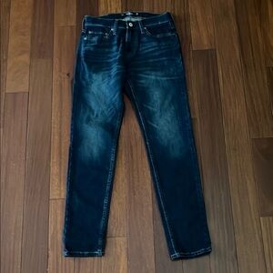 Hollister Men’s Blue Skinny Jeans with Distressed Vintage Style